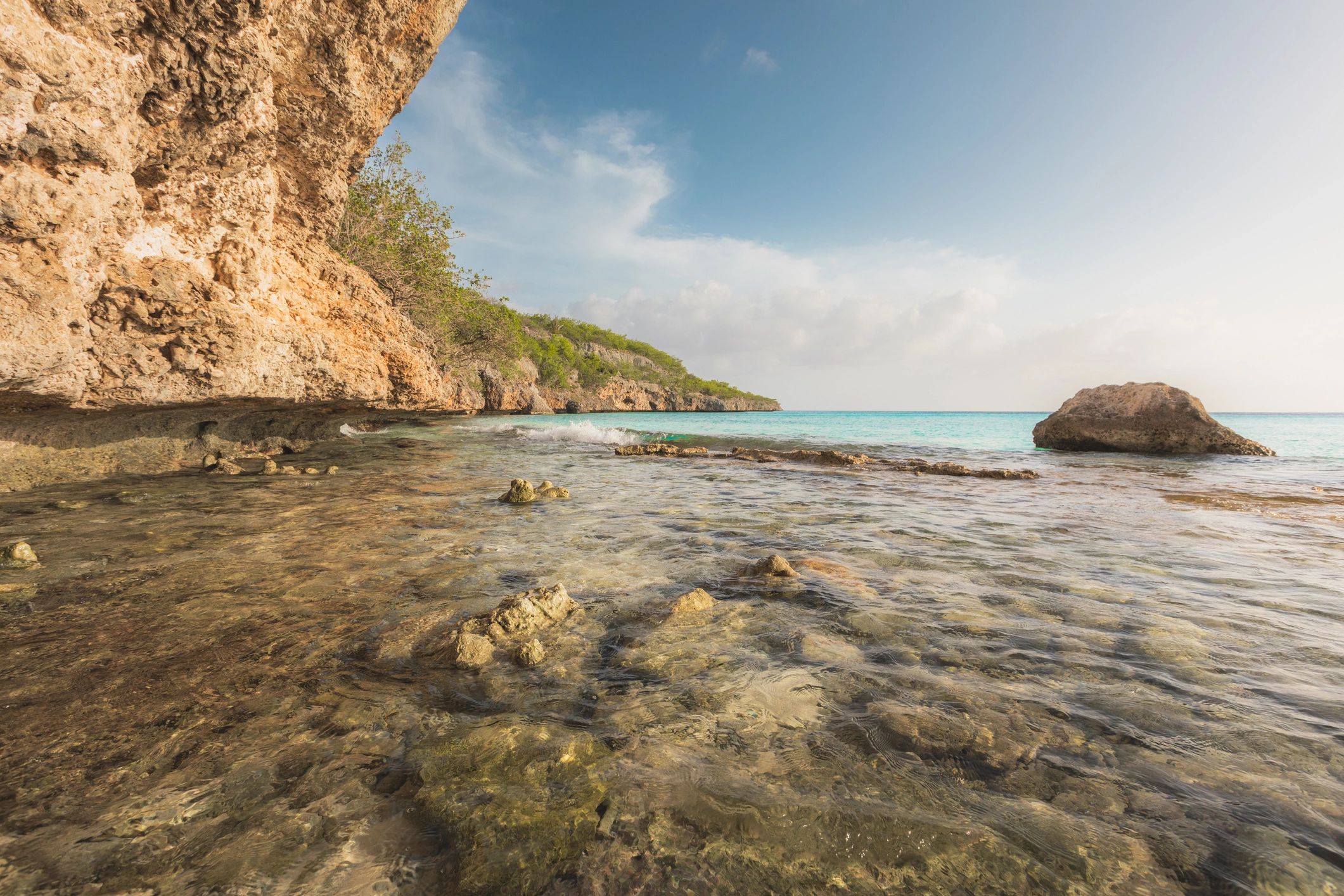 Reef cliff coastal line with clear waters in Curacao