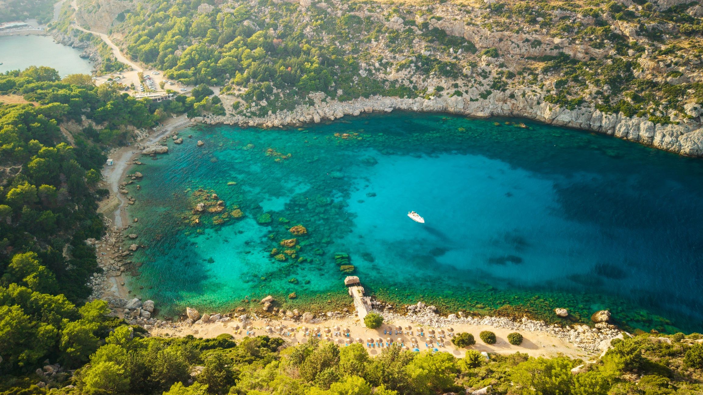 Aerial tropical island coast with turquoise water